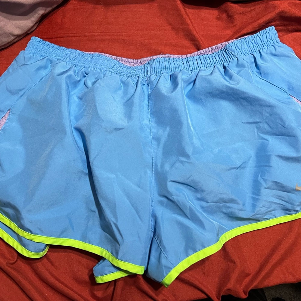 nike light blue and green and purple shorts